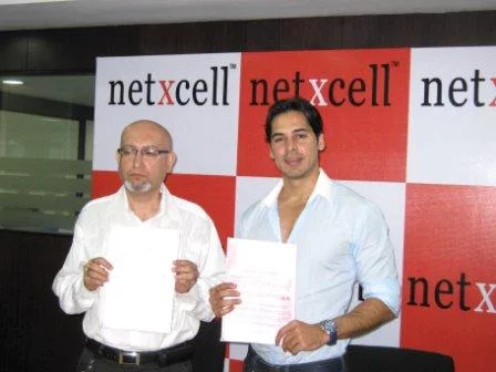 Mr.Debasis Chatterji, CEO, Netxcell Ltd (left) and Mr.Dino Morea, Director, Clockwork Mobile (Right) at the signing ceremony for managing mobile content for Clockwork Mobile Mr.Debasis Chatterji, CEO, Netxcell Ltd (left) and Mr.Dino Morea, Director, Clockwork Mobile (Right) at the signing ceremony for managing mobile content for Clockwork Mobile